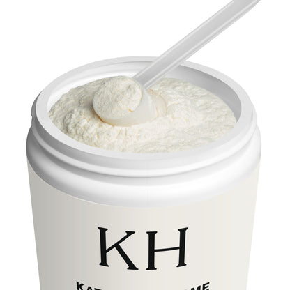 Lifestyle shot showing the KH jar open with a scoop resting in the unflavored collagen powder.