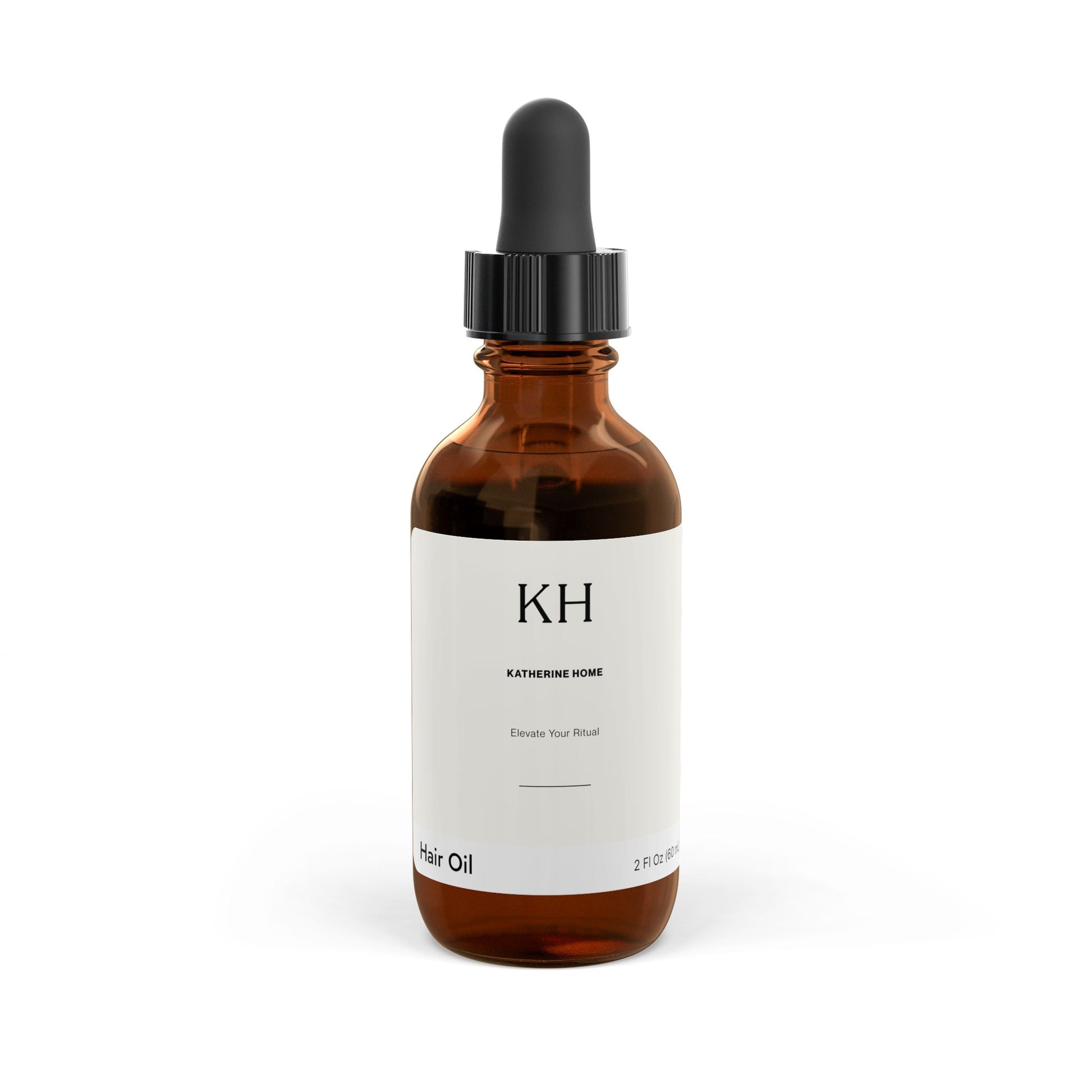 Amber glass bottle of Katherine Home Hair Oil with black dropper, front view, 2 fl oz